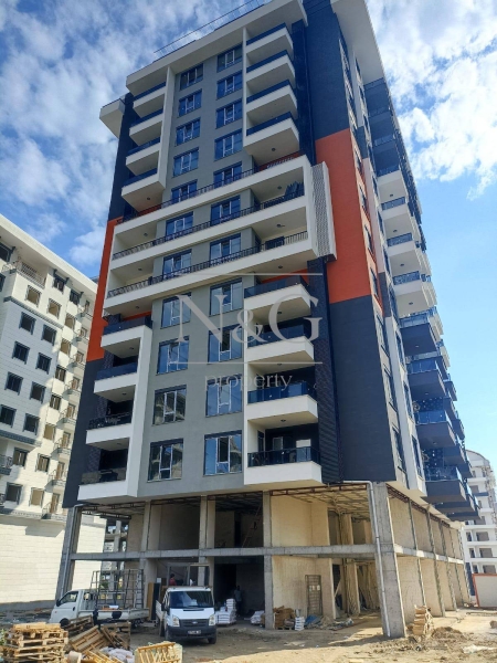 Новая квартира 2+1 в сданный комплексе в Махмутларе в 600м от моря